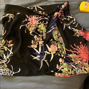 Black floral patterned wrap skirt